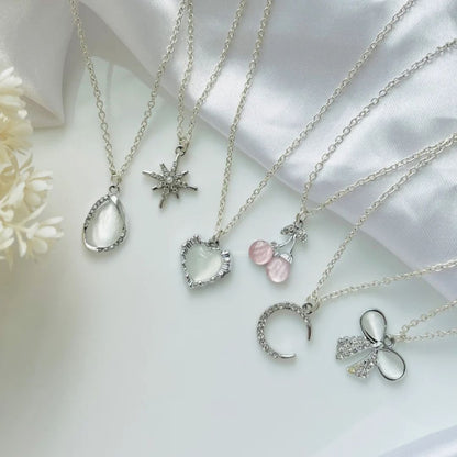 TOPPERSKIT Elegant Silver-Tone Charm Necklace with assorted pendants